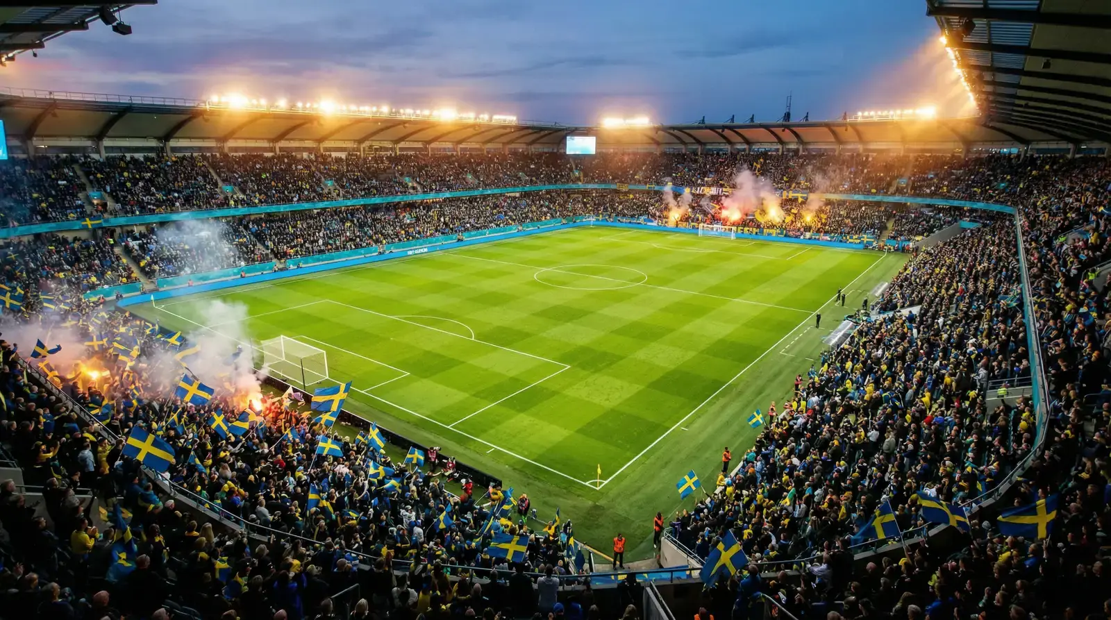 Fotbollsstadion under VM 2026 med svenska flaggor i publikhavet